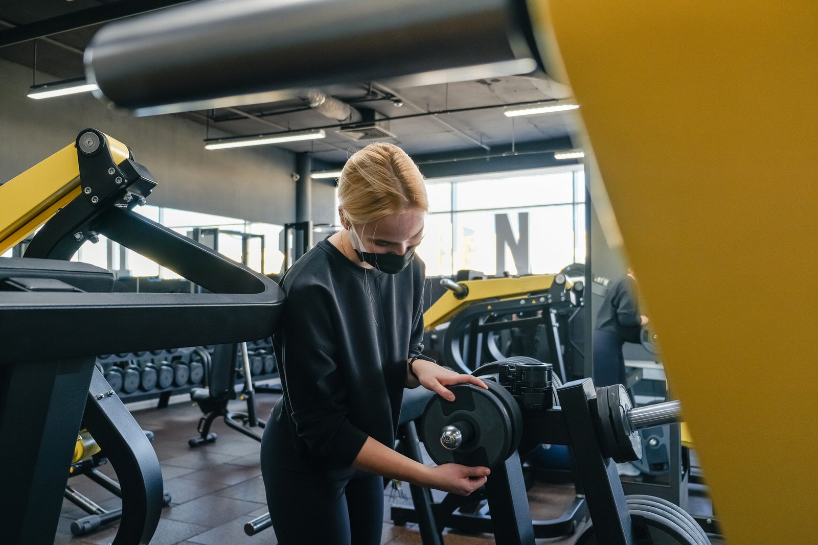 Fitness,sports.fit,Girl in mask fitness gym opening lockdown covid passport,QR cod Wellness, health care,generation z sports recreation concept online fitness apps