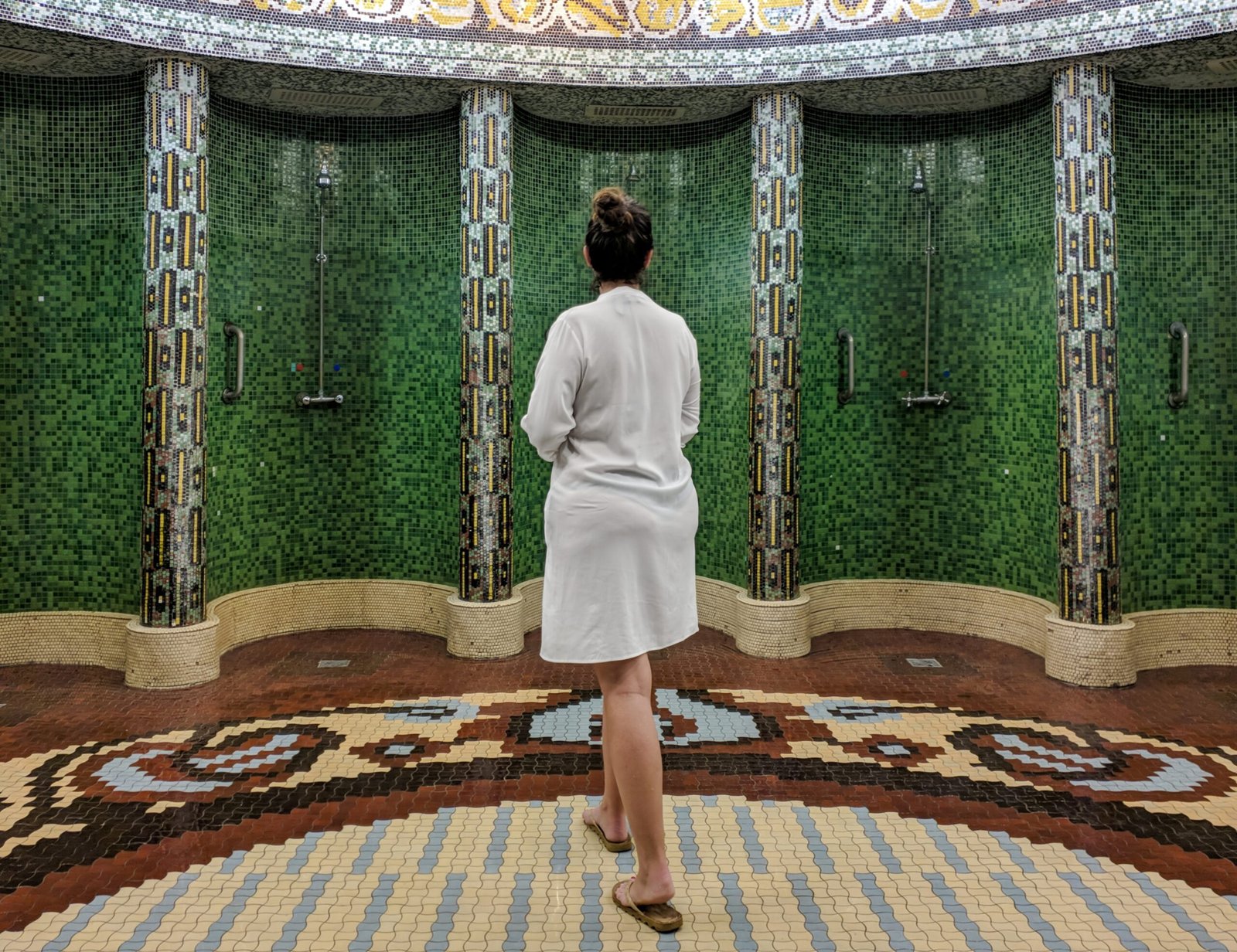 rear-view-of-woman-wearing-white-satin-bathrobe-s-2026-01-09-01-06-45-utc